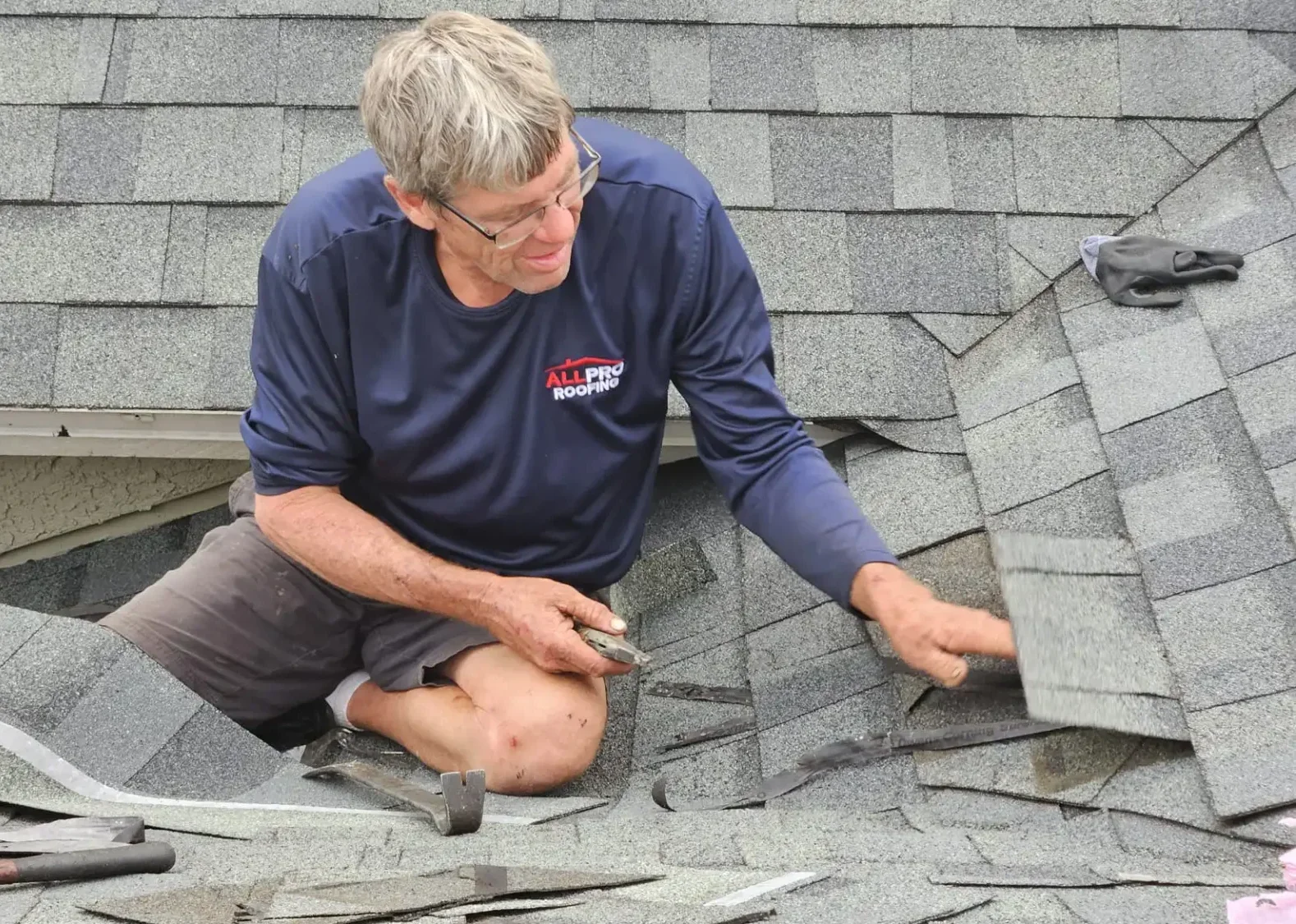 Roof being repaired by All Pro Roofing